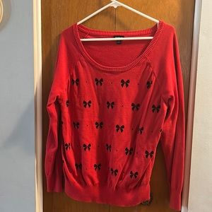 Torrid red sweater with black bows